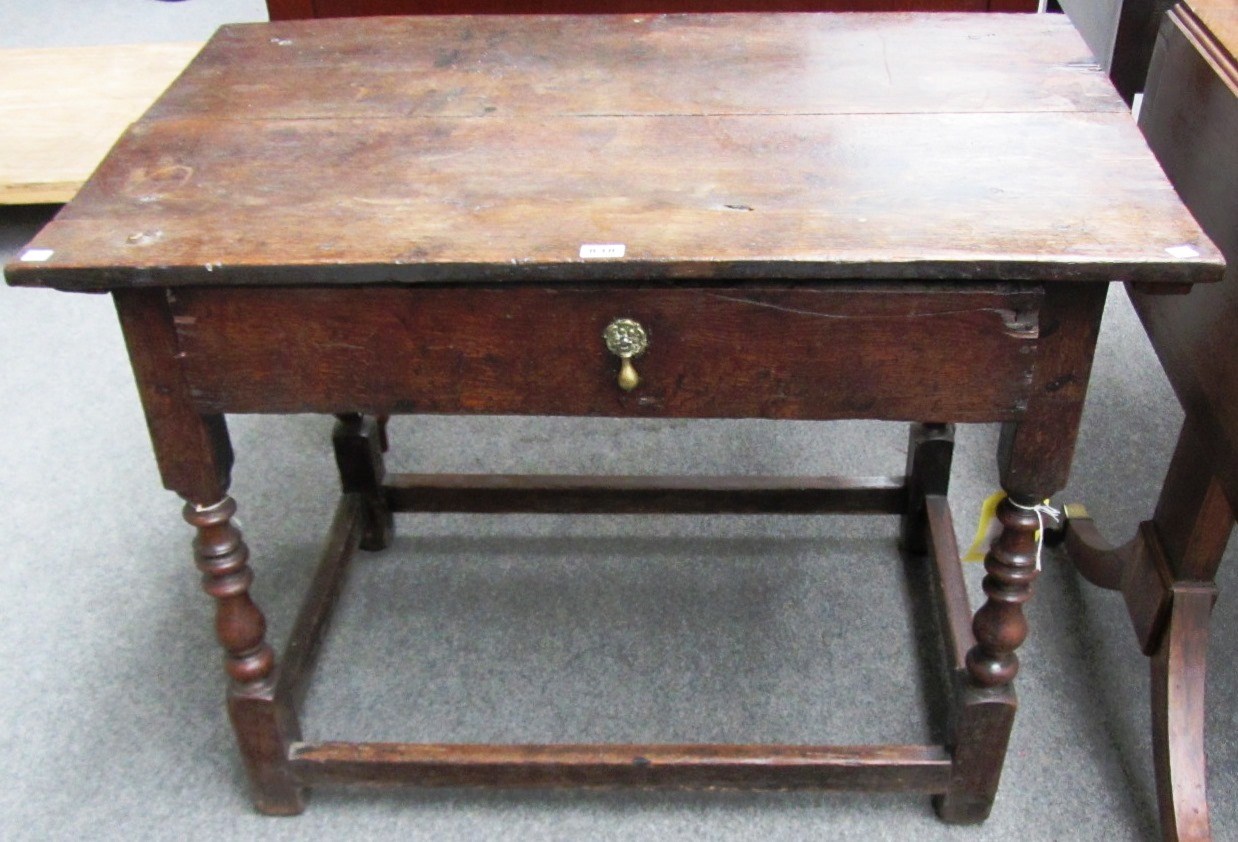 Appraisal: An th century oak side table the double plank top