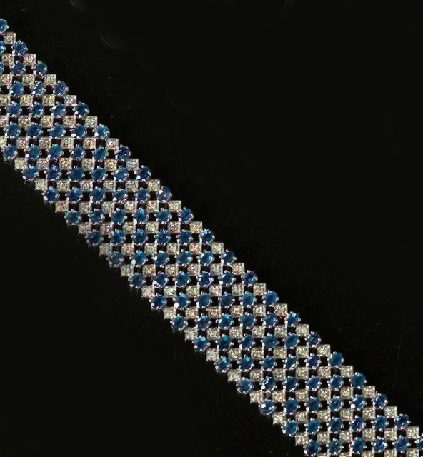 Appraisal: Fourteen-Karat White Gold Sapphire and Diamond Bracelet the flexible strap