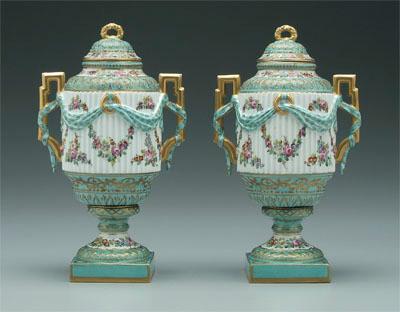 Appraisal: Pair S vres porcelain urns cylindrical fluted bodies entwined with