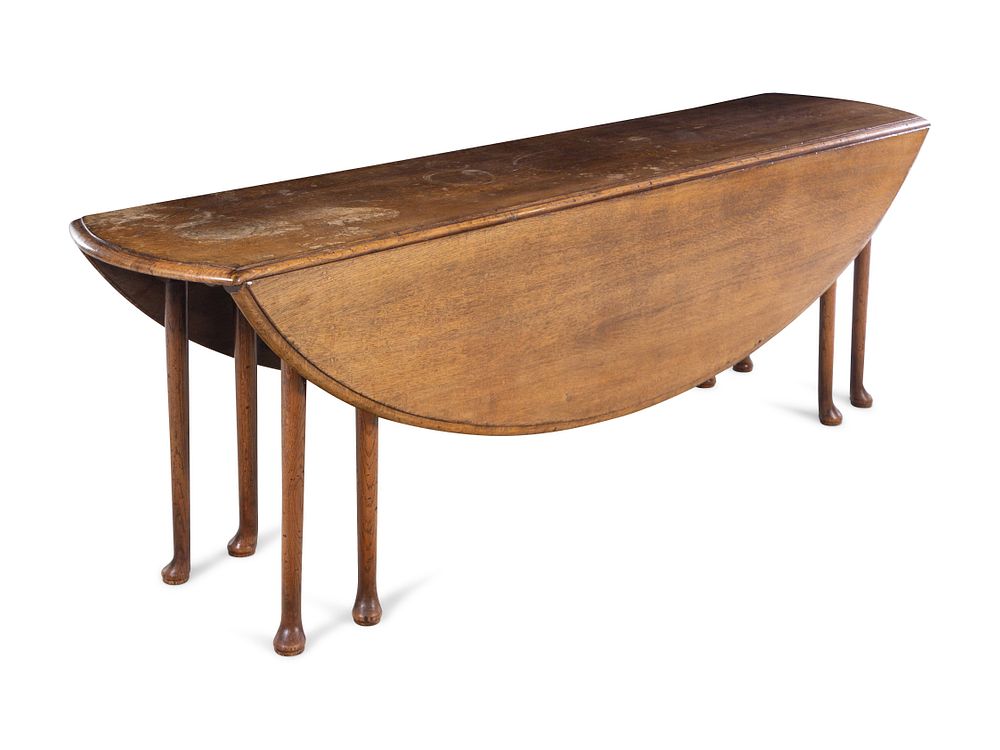 Appraisal: An Irish George III Oak Drop-Leaf Table An Irish George