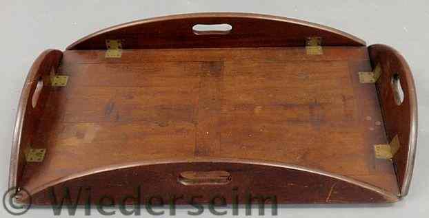 Appraisal: Mahogany butler's tray th c with four brass hinged fold-down