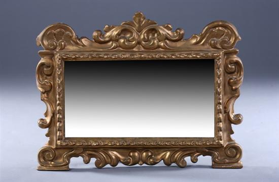 Appraisal: CONTINENTAL ROCOCO STYLE GILT WOOD HANGING WALL MIRROR th Century