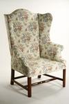 Appraisal: WING CHAIR - th C replica upholstered high back wing