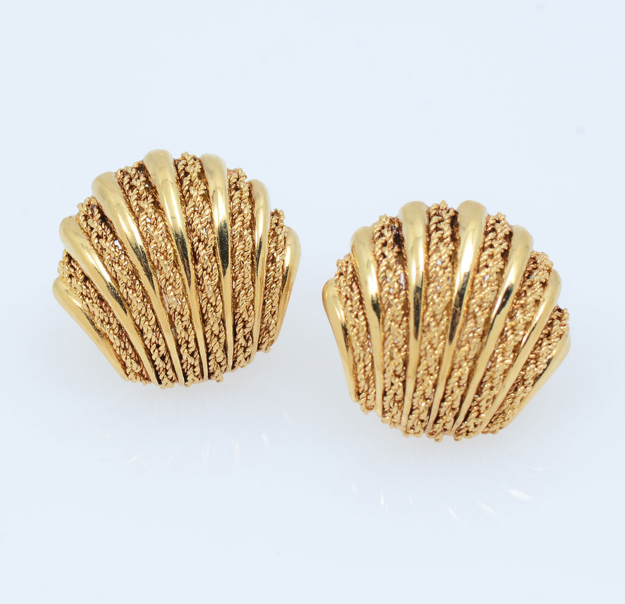 Appraisal: K SHELL STUD EARRINGS Yellow gold shell earrings with braided