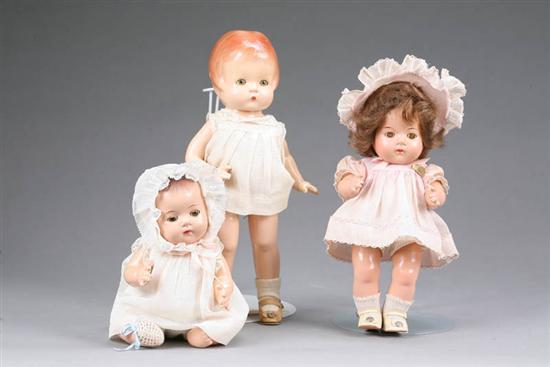 Appraisal: THREE DOLLS Two Madame Alexander baby dolls with sleep eyes