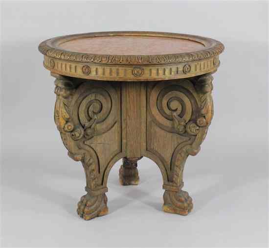 Appraisal: A th century German carved oak circular centre table of