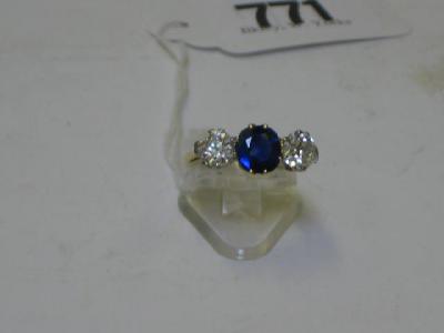 Appraisal: A SAPPHIRE AND DIAMOND THREE STONE RING the rich blue