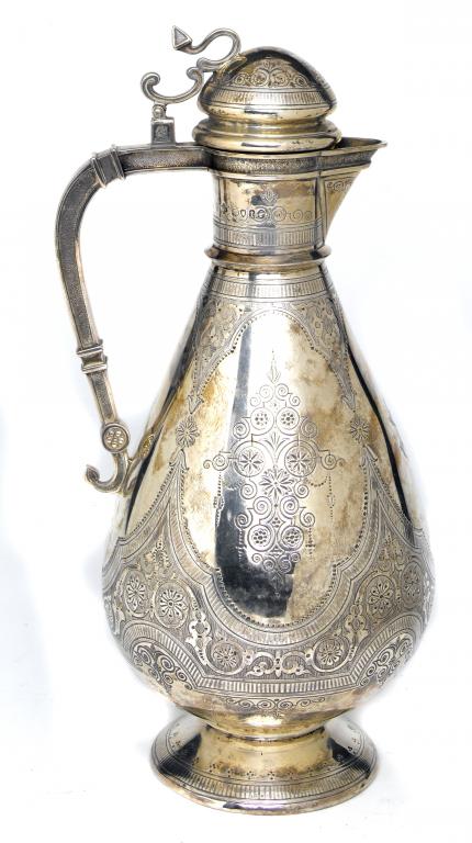 Appraisal: A VICTORIAN CLARET JUG in Persian style with domed lid