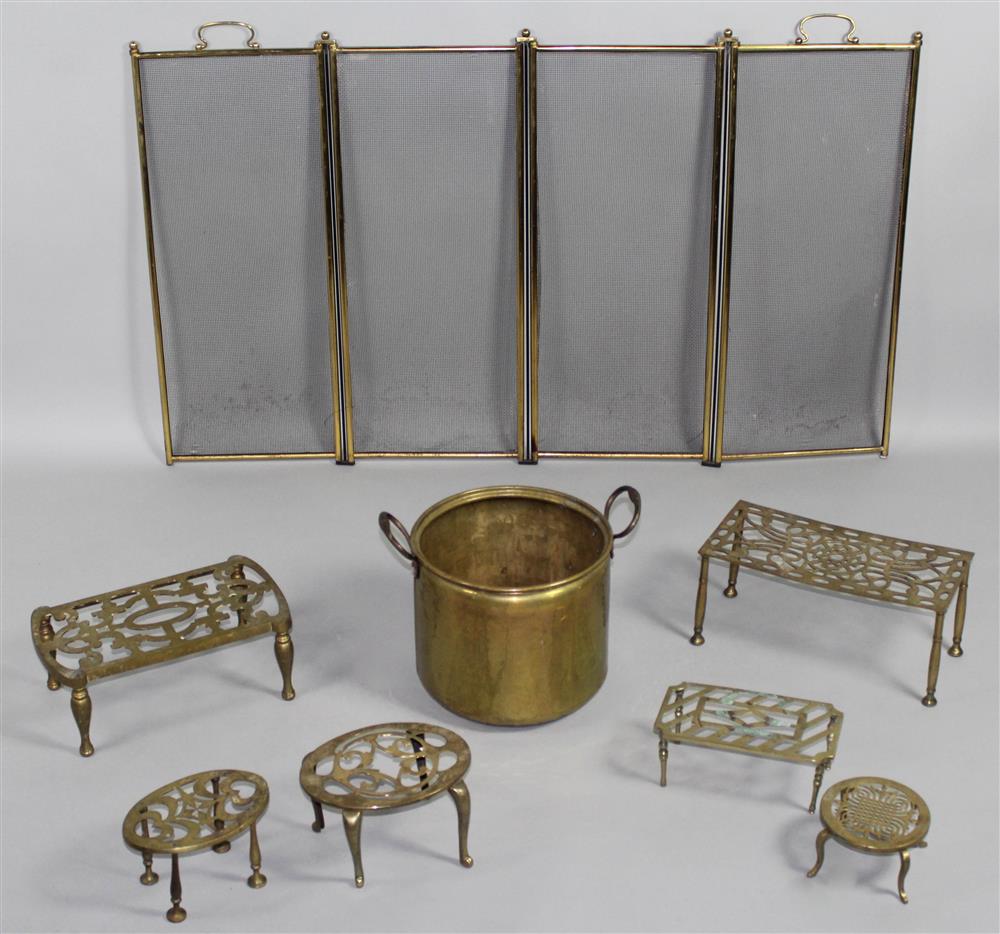 Appraisal: SIX BRASS TRIVETS A BUCKET AND FIRESCREEN the trivets of