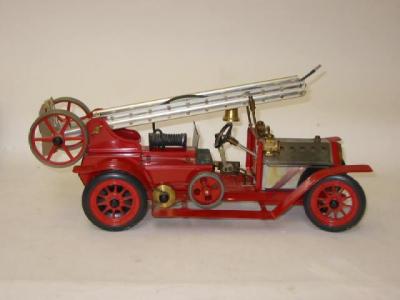 Appraisal: A fire engine probably Wilesco solid fuel steam powered in