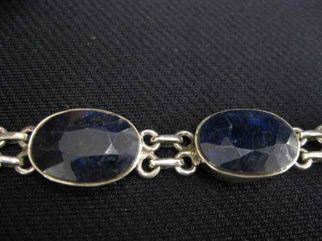 Appraisal: Sapphire Bracelet five large oval African deep blue gems totaling