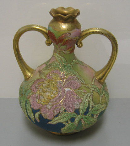 Appraisal: NIPPON CORALENE DOUBLE HANDLED VASE With large looping handles decorated