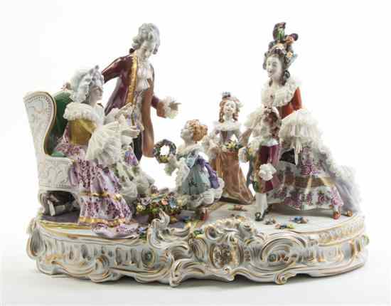 Appraisal: A Dresden Porcelain Lace Figural Group depicting a family in