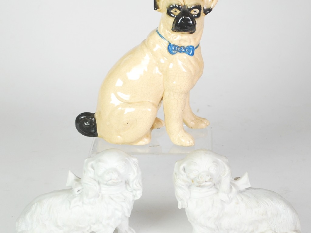 Appraisal: PAIR OF EARLY TWENTIETH CENTURY PARIAN WARE FIGURES OF PEKINGESE