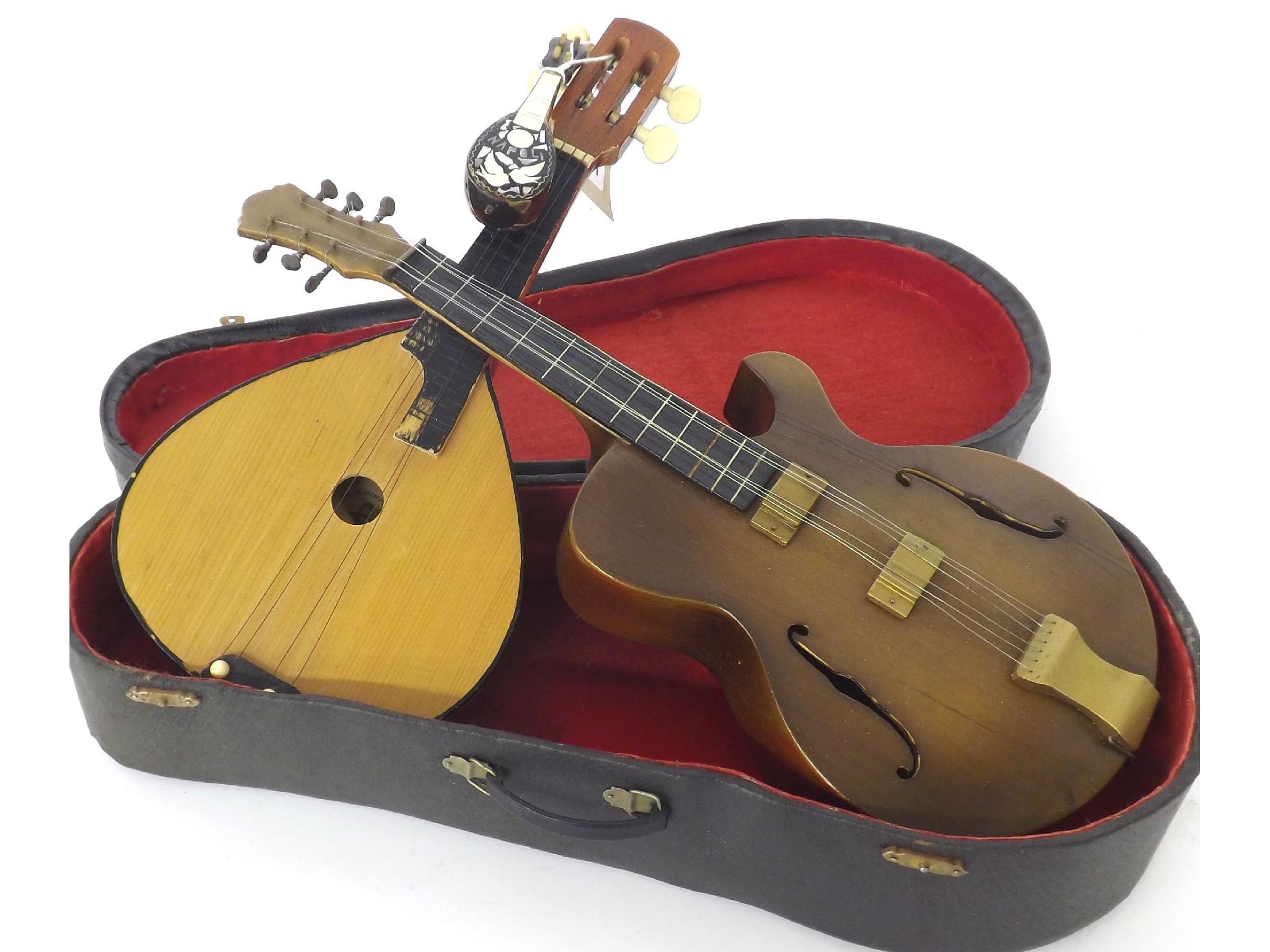 Appraisal: Miniature model of an archtop guitar case together with a