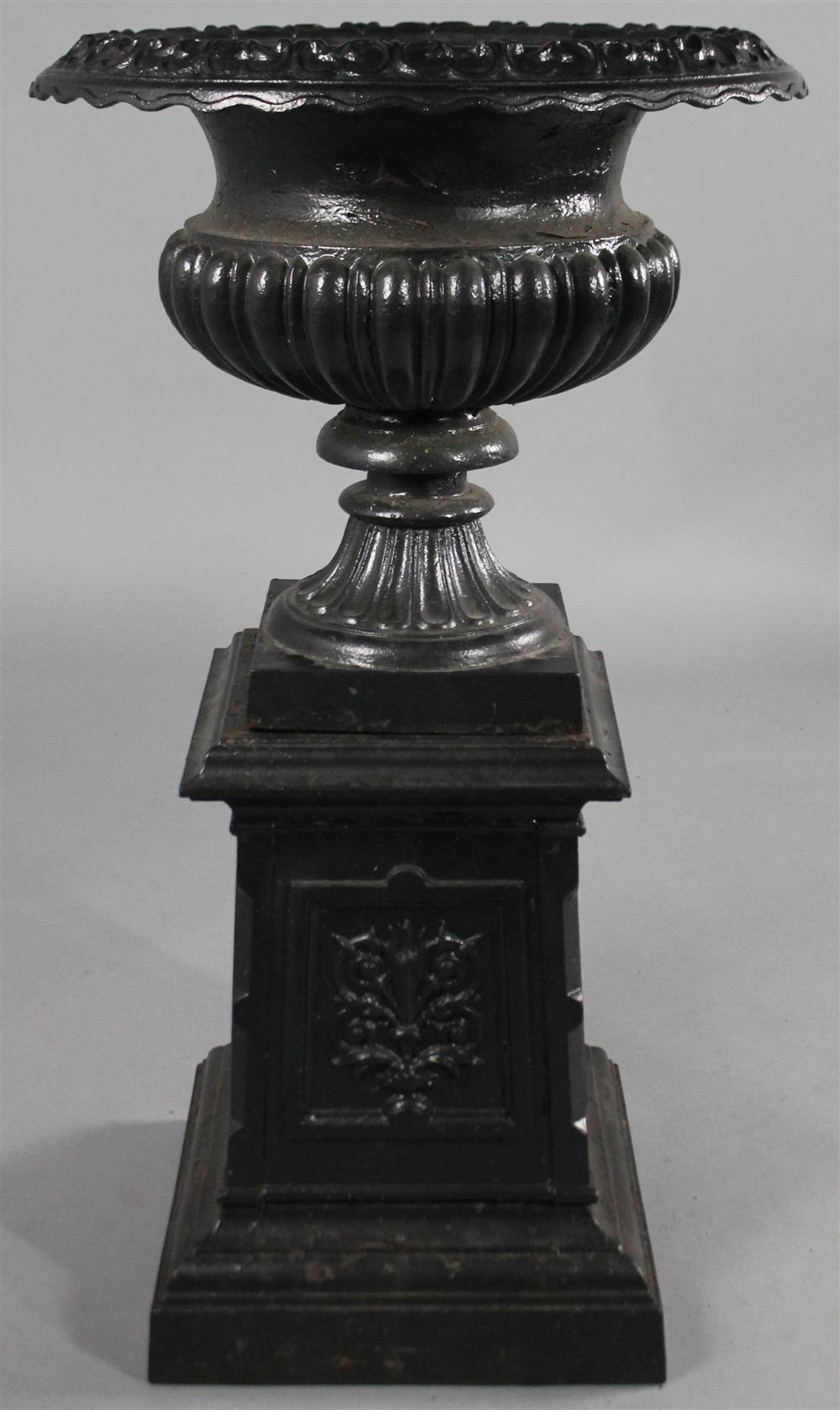 Appraisal: CAST IRON GARDEN URN ON PEDESTAL BASE Victorian English cast