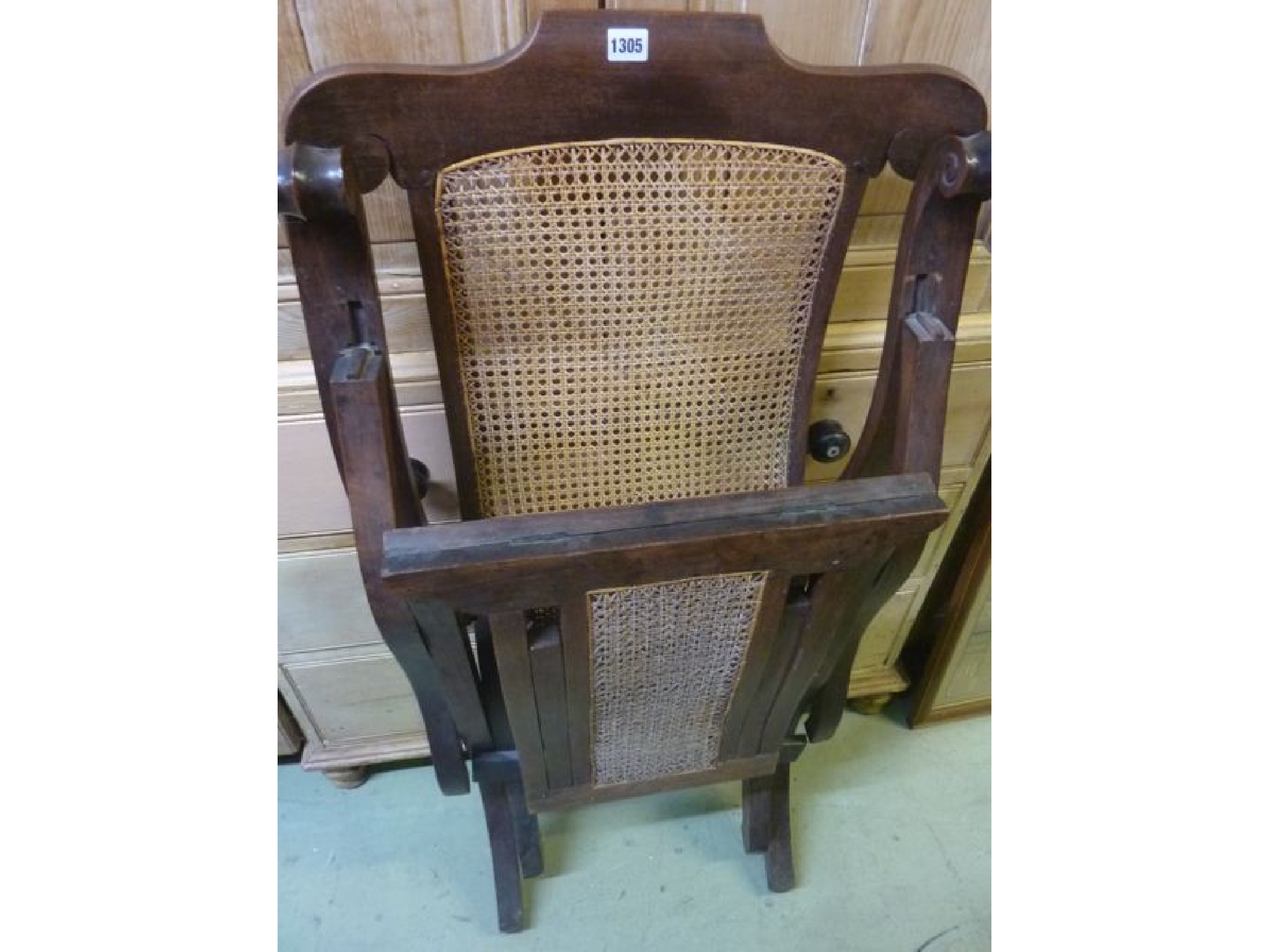 Appraisal: A Victorian mahogany steamer type folding chair with shaped outline