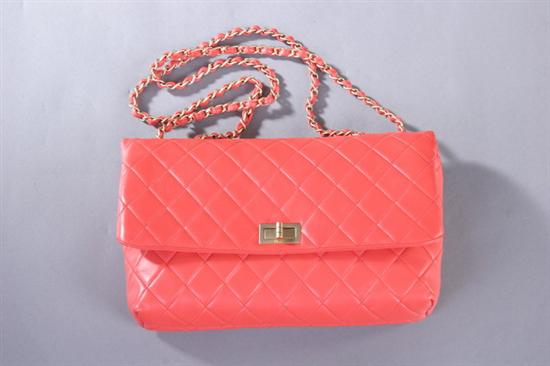 Appraisal: ORANGE LEATHER CHANEL HANDBAG WITH BOX Quilted exterior with gold