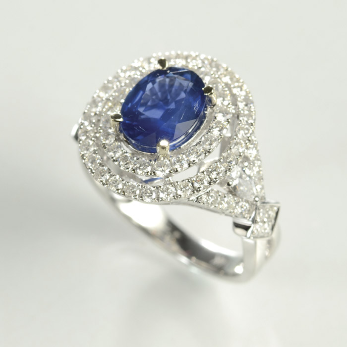 Appraisal: SAPPHIRE DIAMOND AND FOURTEEN KARAT GOLD RING The white gold