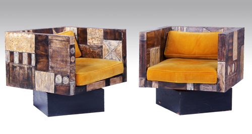 Appraisal: PAUL EVANS Exceptional pair of Sculpted Steel cube chairs with