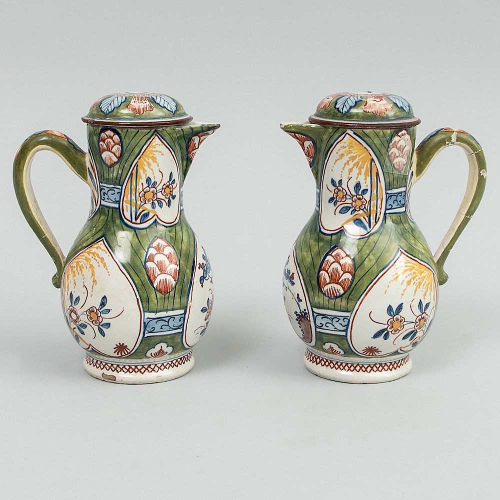 Appraisal: Pair of Dutch Delft Oil and Vinegar Cruets and Covers