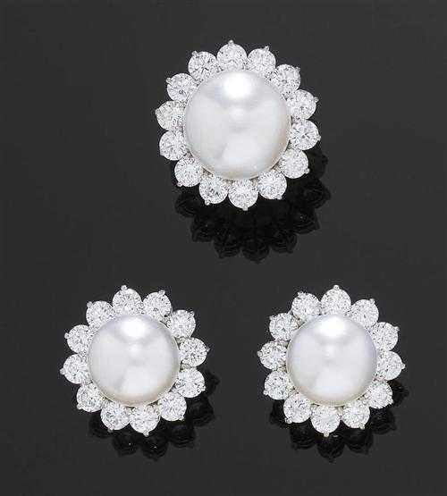 Appraisal: PEARL AND BRILLIANT-CUT DIAMOND CLIP EARRINGS WITH RING ca White