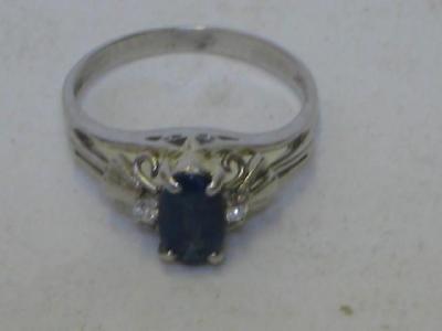 Appraisal: A SAPPHIRE AND DIAMOND RING the oval cut sapphire claw