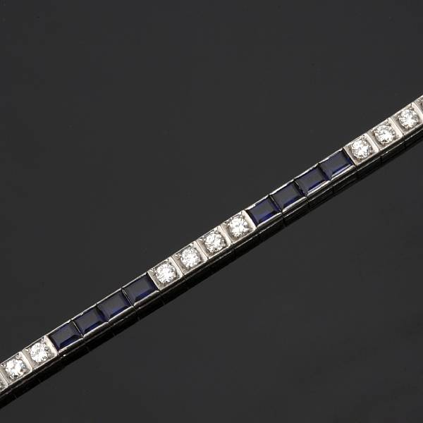 Appraisal: A diamond and synthetic sapphire line bracelet estimated total diamond