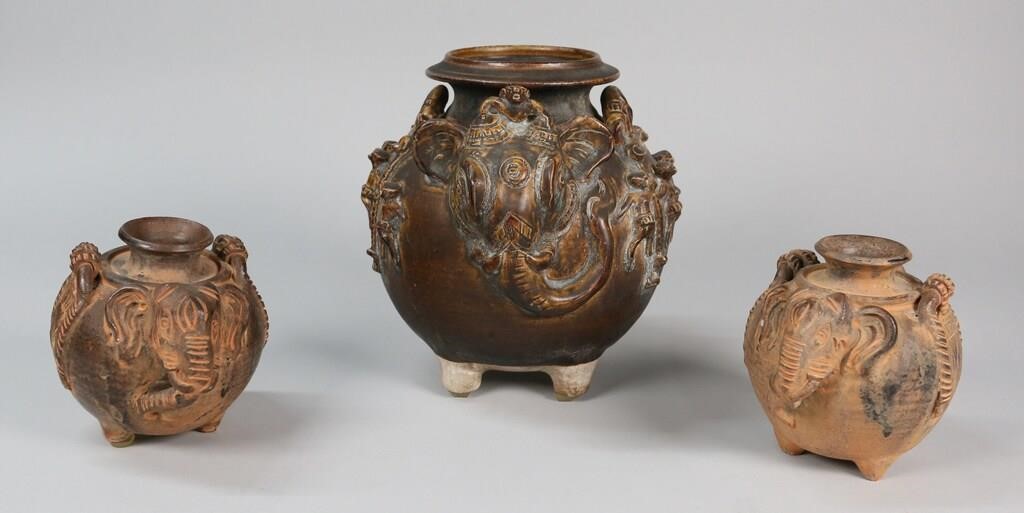 Appraisal: Cambodian Khmer style elephant form brownware pottery jars Pair of