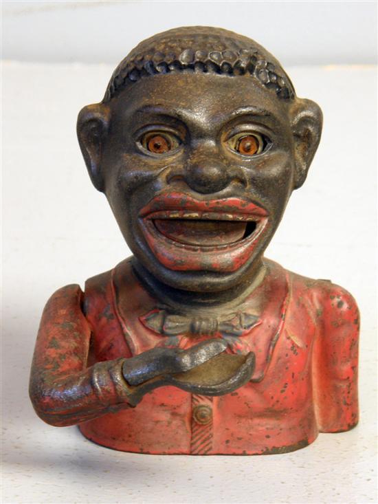 Appraisal: Cast iron and painted Jolly Negro money bank h in