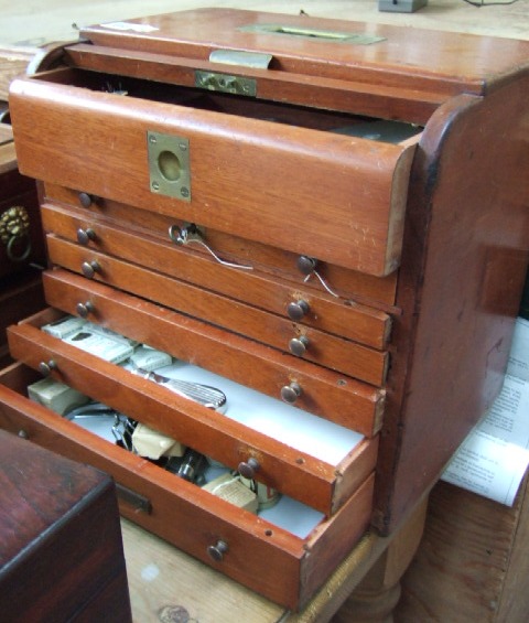 Appraisal: A mid th century mahogany dentists box the tambour top