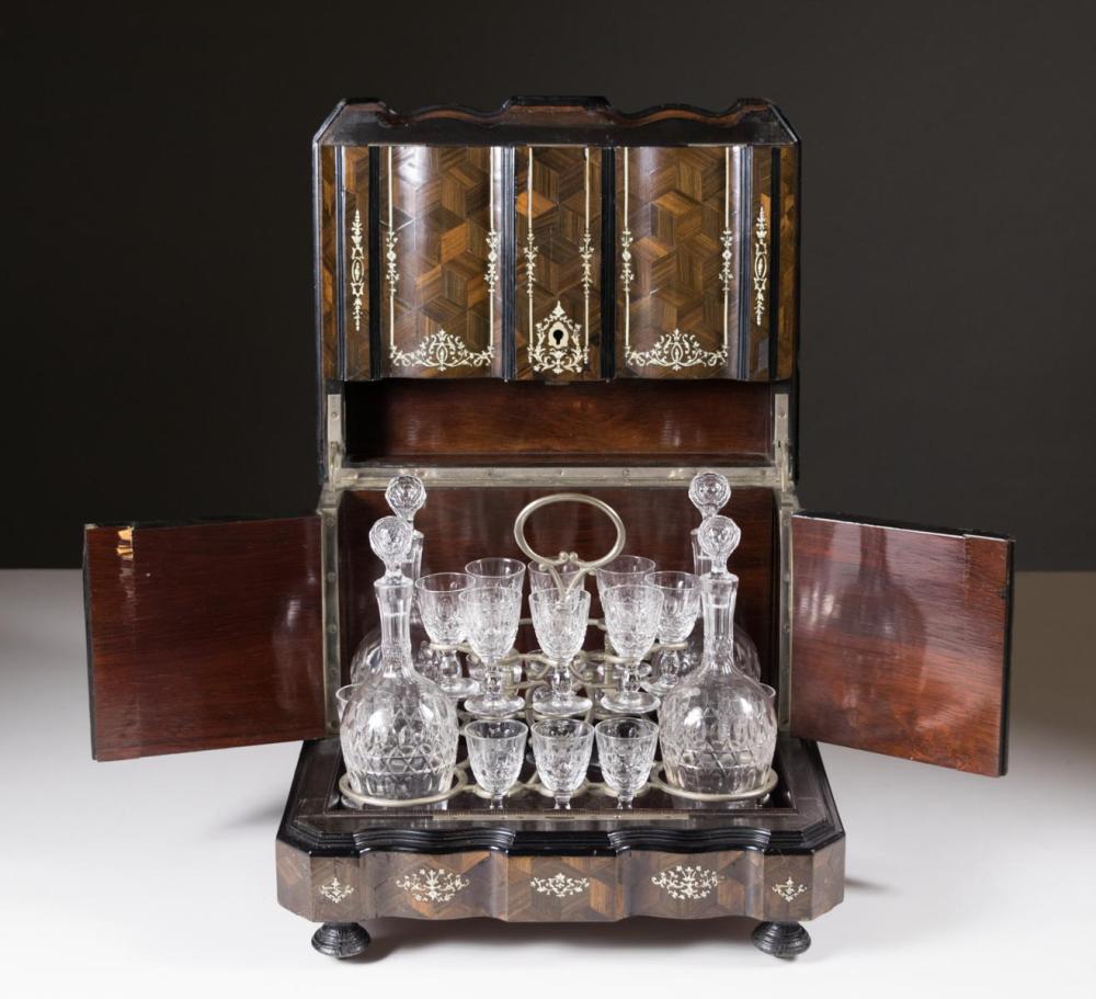 Appraisal: FRENCH ROSEWOOD LIQUEUR SET with parquetry and inlaid exterior lift