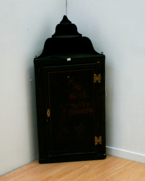 Appraisal: A George III black japanned corner cabinet