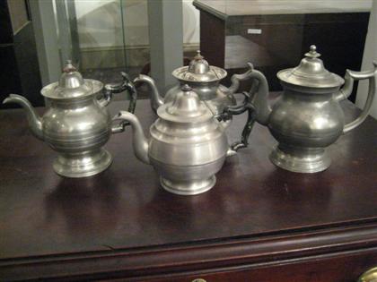 Appraisal: Four pewter teapots roswell gleason - dorchester ma Each with