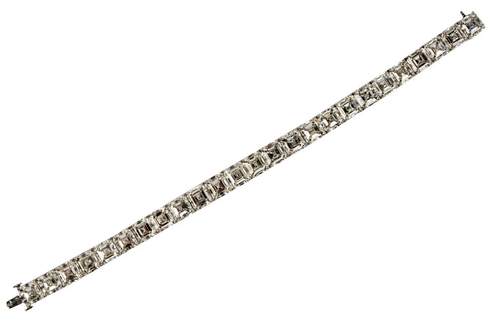 Appraisal: PLATINUM DIAMOND STRAIGHTLINE BRACELETcontaining square emerald cut diamonds F-G VVS