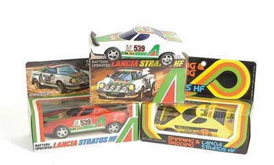 Appraisal: Lancia Stratos x battery operated plastic Cars Consisting of Echo