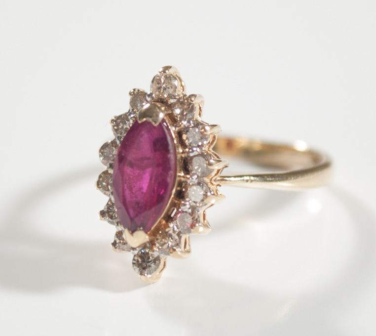 Appraisal: RUBY DIAMOND AND FOURTEEN KARAT GOLD RING with round-cut diamonds