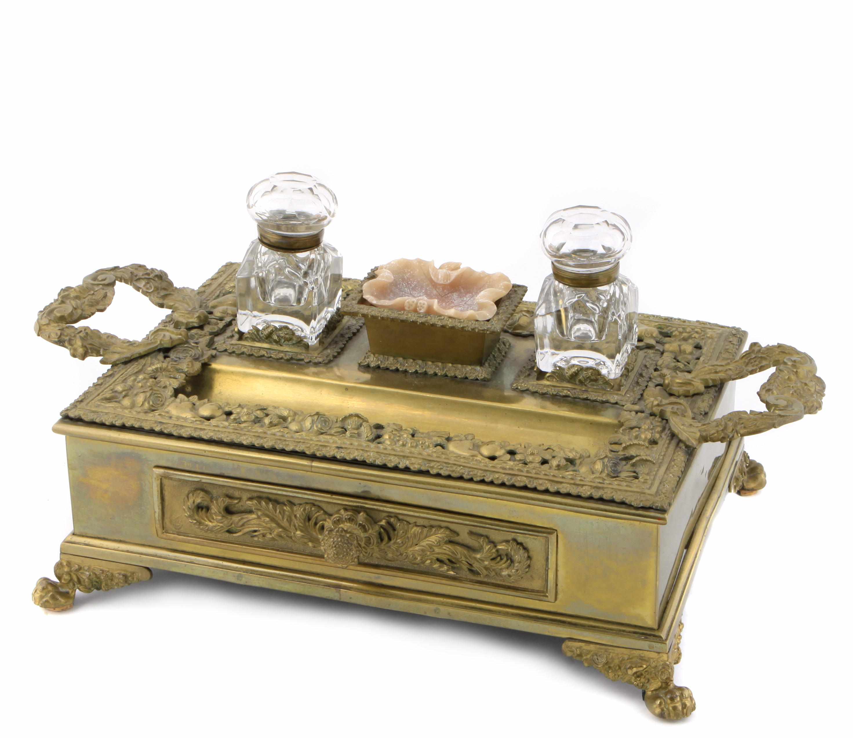 Appraisal: A Renaissance Revival brass inkstand height excluding compartments in width