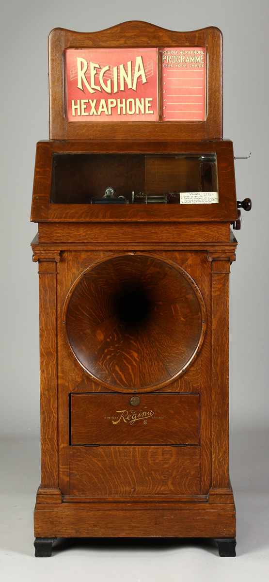 Appraisal: Regina ''Hexaphone'' Model Coin-Op Phonograph With its powerful aesthetic tall