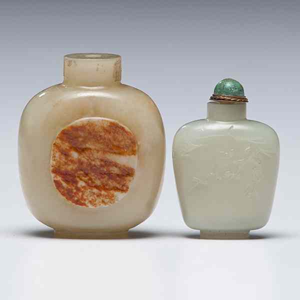 Appraisal: Chinese Jade Snuff Bottles Chinese Two jade snuff bottles the