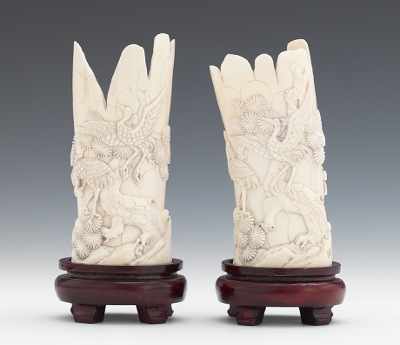 Appraisal: A Pair of Carved Ivory Scenic Vases Carved from tusk