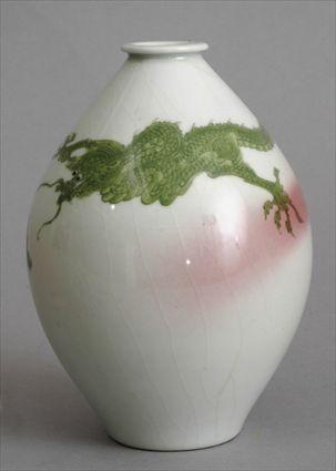 Appraisal: JAPANESE PORCELAIN OVOID DRAGON VASE Decorated with green scaley dragon