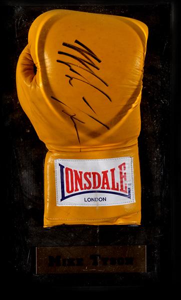 Appraisal: X MIKE TYSON PHOTOGRAPHS AND GLOVE IN PERSPEX CASE SIGNED