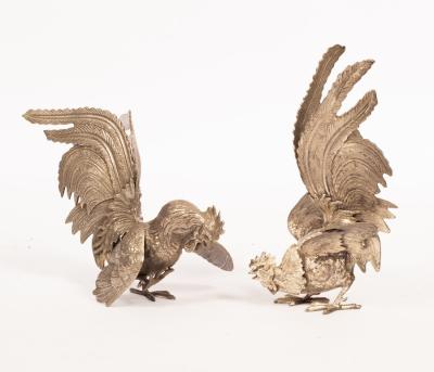 Appraisal: A pair of plated fighting cock table ornaments cm high