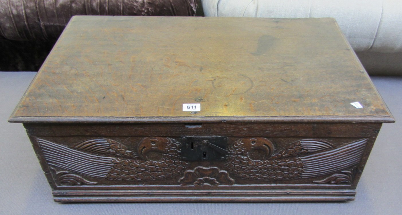 Appraisal: A Charles II rectangular oak box the front panel carved