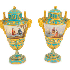 Appraisal: A Pair of S vres Style Porcelain Urns and Covers