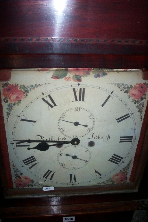 Appraisal: A Georgian oak long case clock with reeded column supports