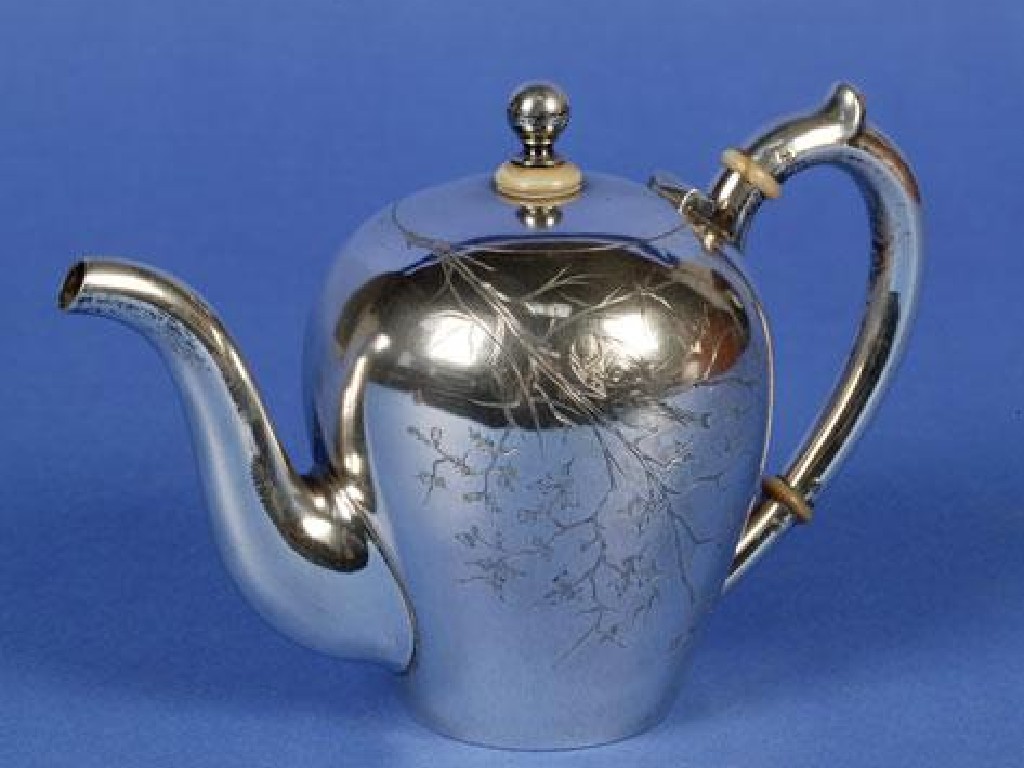 Appraisal: A RUSSIAN TEAPOT of circular form with a scroll handle