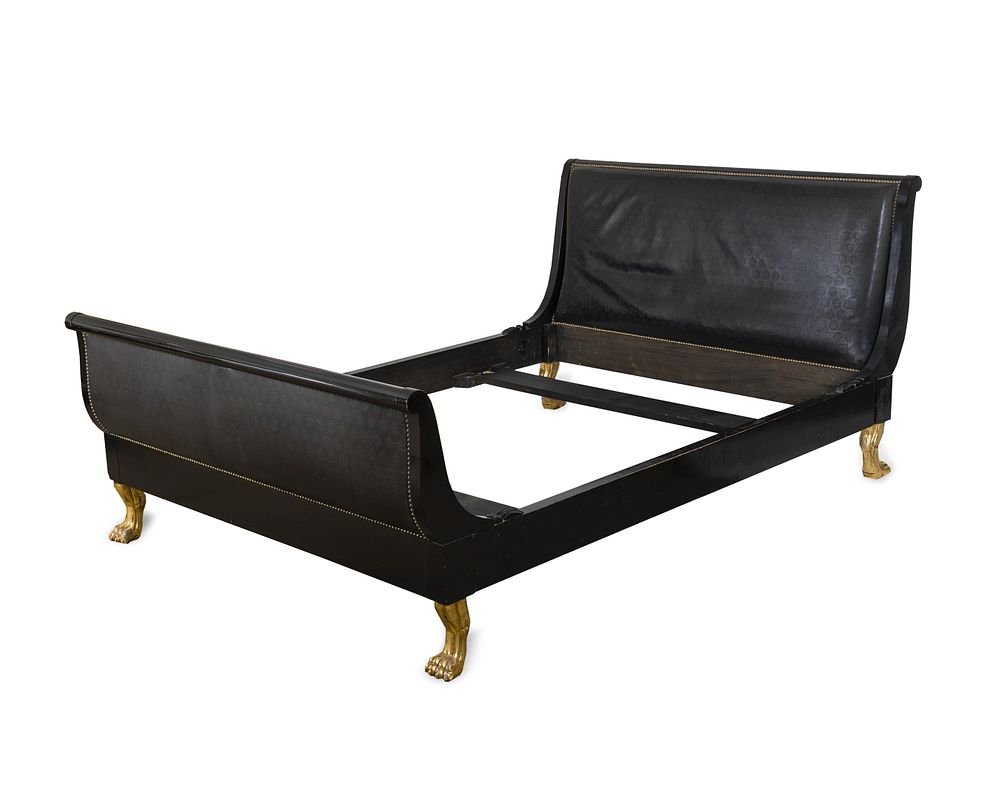 Appraisal: An Empire Style Ebonized and Gilt Wood Sleigh Bed Height