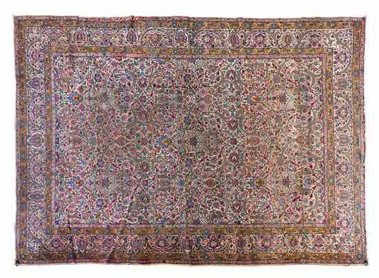 Appraisal: A Persian Wool Carpet having allover foliate and floral scrolls